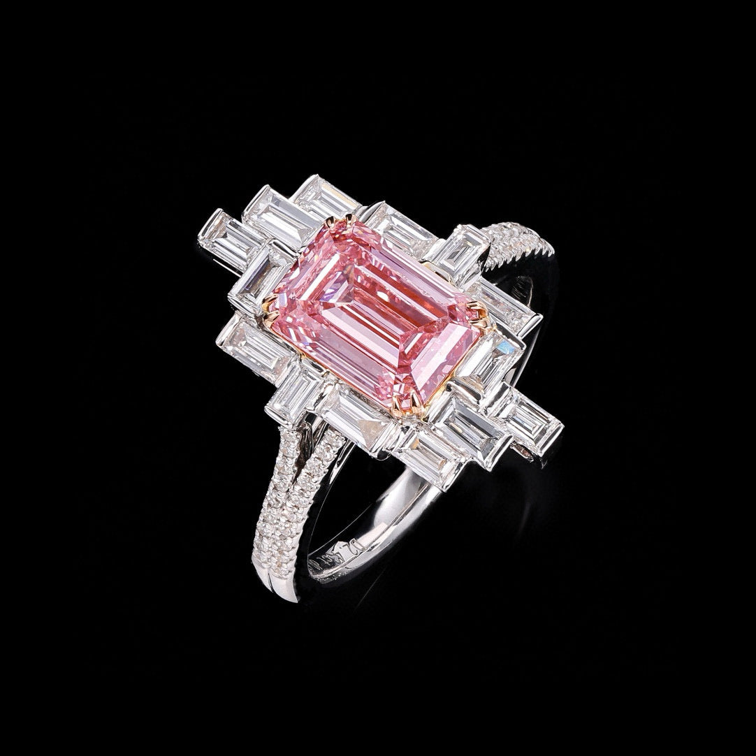 18K fancy-shaped pink diamond ring with white diamond accents
